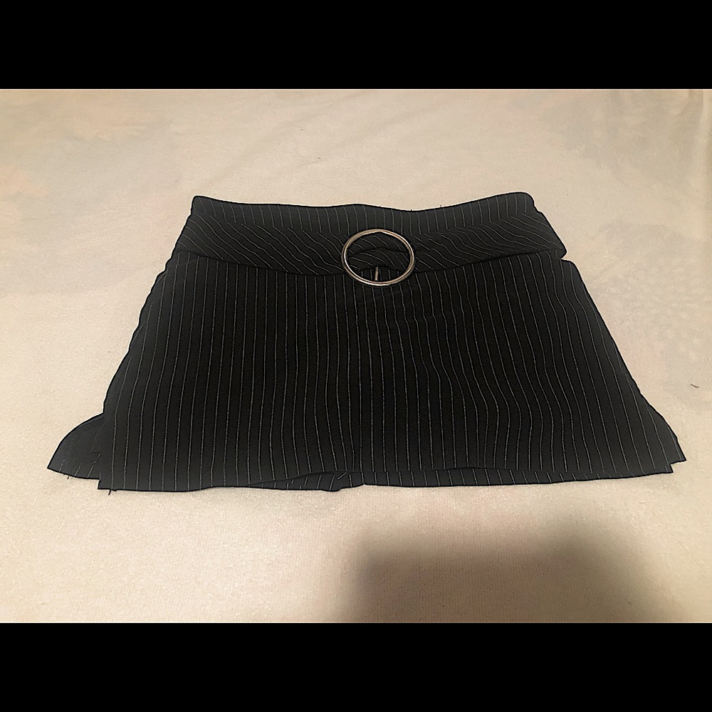 Spice Wear black pin-striped skort.